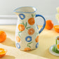 Orange Bloom Pitcher