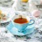 Blue Bunny Luster Tea Cup and Saucer