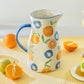 Orange Bloom Pitcher