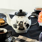 Halloween Witches Brew Teapot with Flying Witch on the back