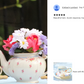 Rose with Blue Accent Fine Porcelain Tea Cup and Saucer