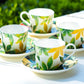 green gold leaves coffee cup